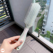 Lược gỡ rối bàn uốn cong