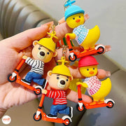 Móc khoá thú chạy xe