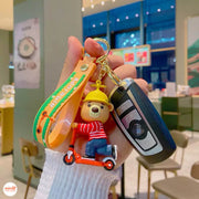 Móc khoá thú chạy xe