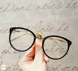 Kính mắt mèo gọng vàng kim