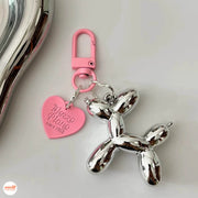 Móc khóa cún tim hồng