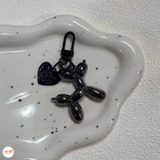 Móc khóa cún tim hồng