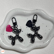 Móc khóa cún tim hồng