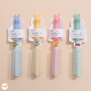 Lược gỡ rối kèm dây cột tóc