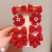 Vỉ 8 kẹp mái nơ đỏ B08