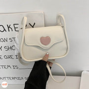 Túi xách trắng tim hồng YD