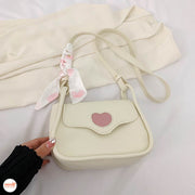Túi xách trắng tim hồng YD