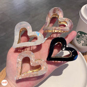 Kẹp càng cua tim màu loang