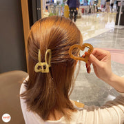 Kẹp càng cua tim màu loang