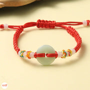 Vòng tay chỉ đỏ 1 đồng điếu đá