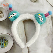 Cài tóc 2 bé 2 mắt tóc xoăn