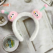 Cài tóc 2 bé 2 mắt tóc xoăn