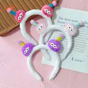 Cài tóc 2 bé 2 mắt tóc xoăn