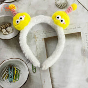 Cài tóc 2 bé 2 mắt tóc xoăn