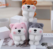 Móc khoá chó ngồi đuôi kêu