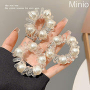 Cột tóc lò xo 5 hạt trai