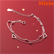 Lắc tay titan lồng đôi 040 tim rỗng mix bi