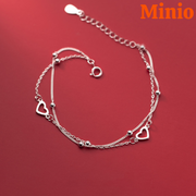 Lắc tay titan lồng đôi 040 tim rỗng mix bi