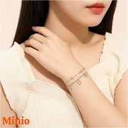 Lắc tay titan lồng đôi 040 tim rỗng mix bi